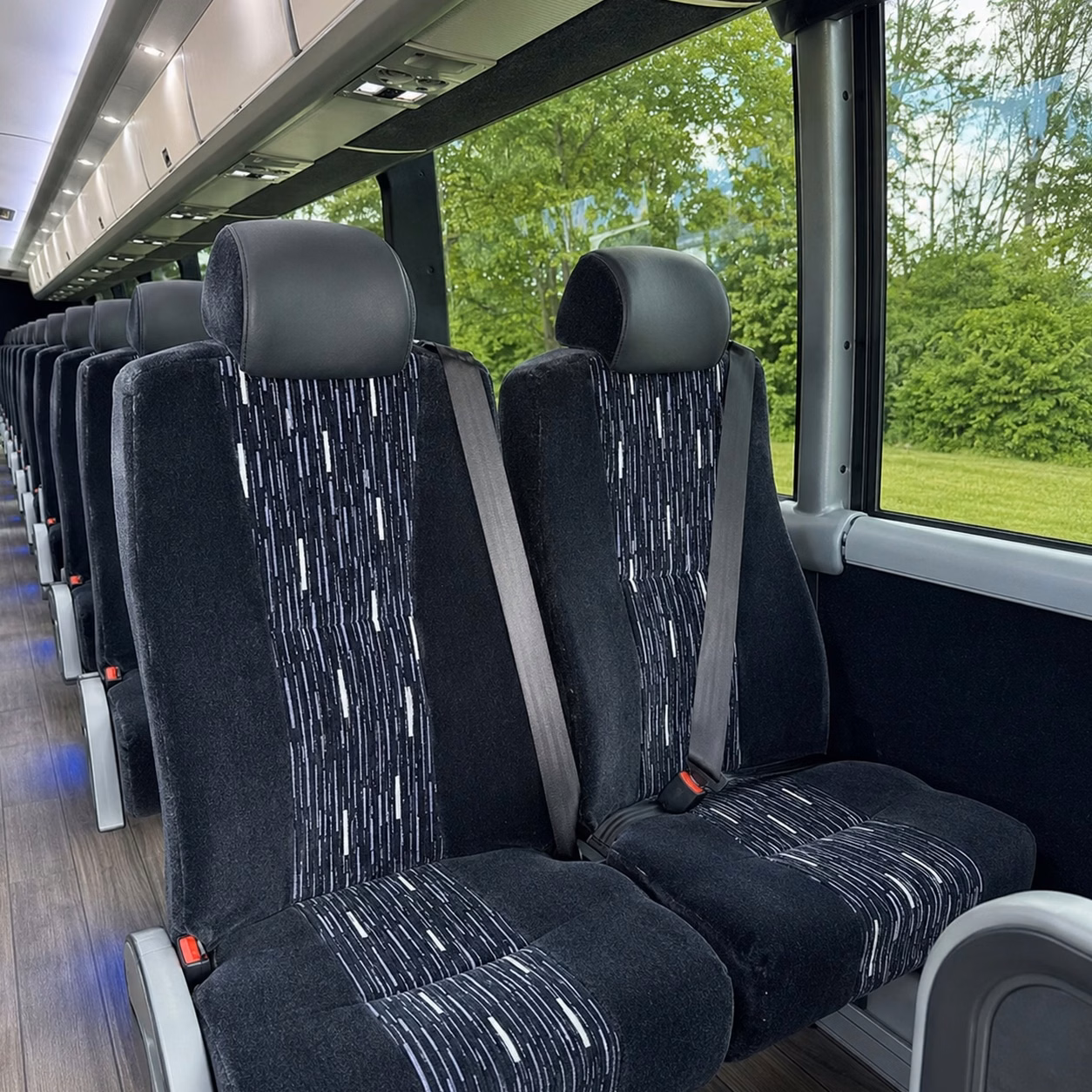 how distance and duration affect charter bus rental rates in woodland